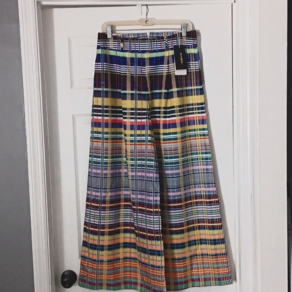 Wild legs pants,  Uoozee ,size m ,new but no bar code tag all other tags are in